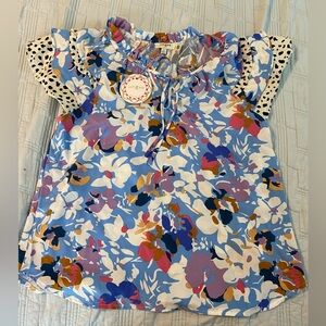 Women’s Size Medium Blouse Brand is Umgee
